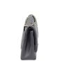Chanel Classic Double Flap Maxi Side
