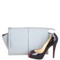 Celine Tri-fold Clutch on Chain Scale