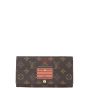 Louis Vuitton Sarah Wallet Monogram Trunks & Locks Front