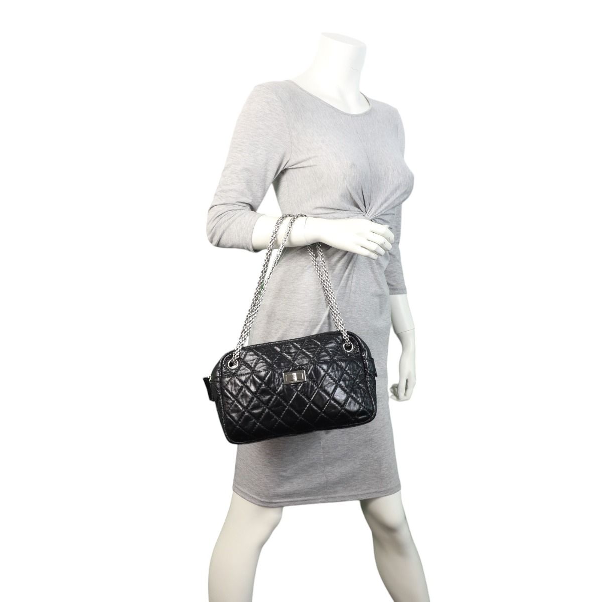 Chanel 2.55 camera bag top