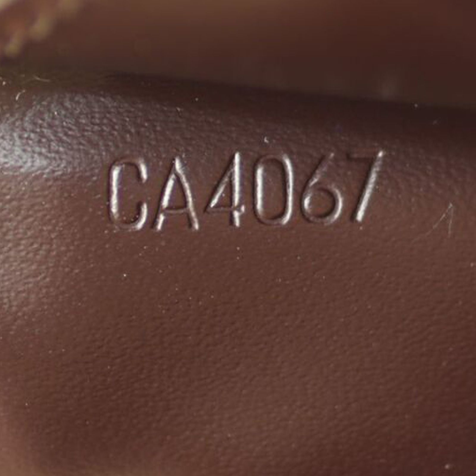 Louis vuitton key pouch serial number best sale