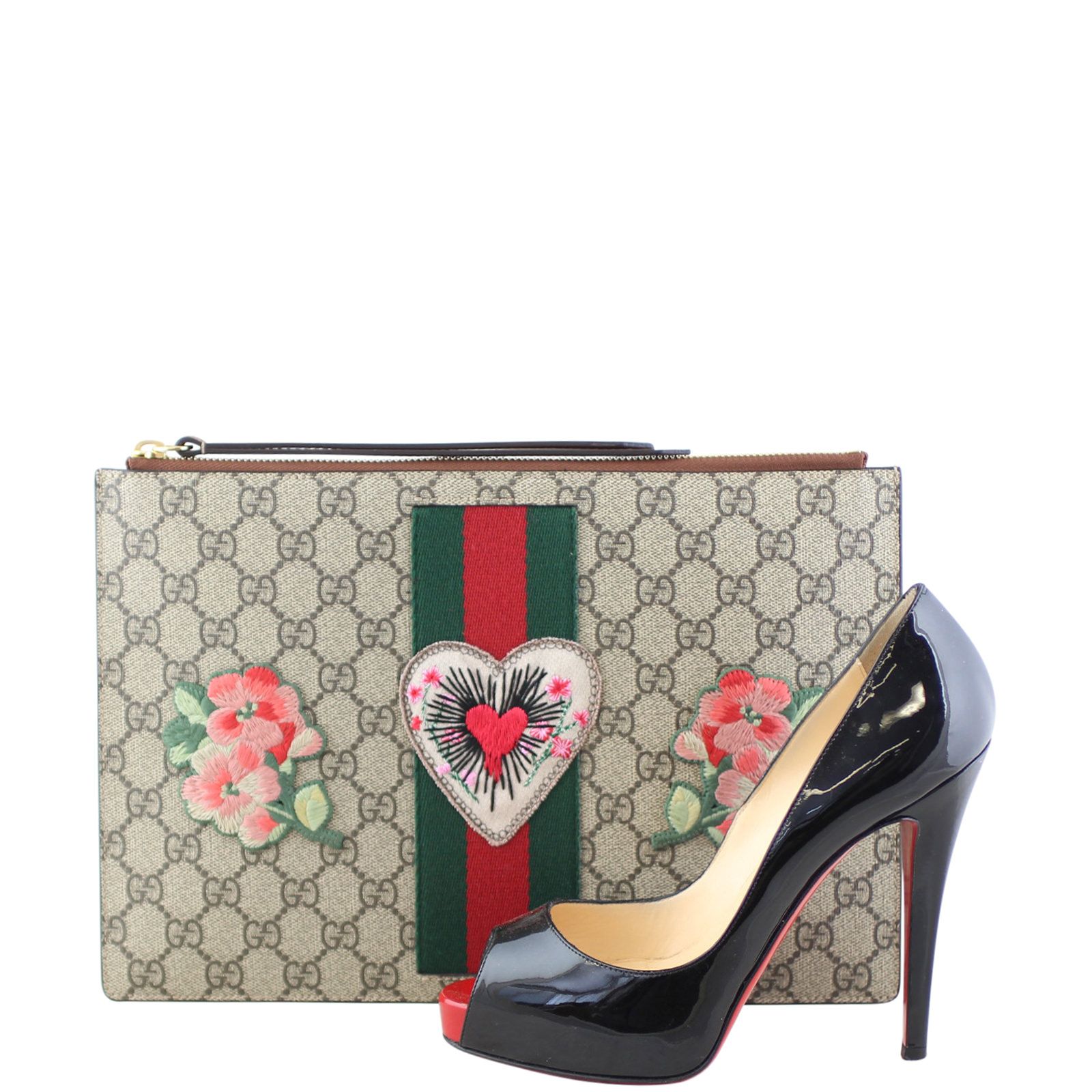 Gucci supreme pouch deals