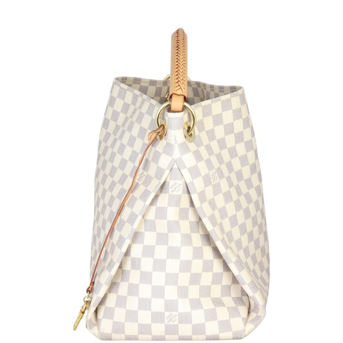 The Artsy MM features a damier azur canvas body, a rolled vachetta handle,  an open top, and interior zip and slip pockets.