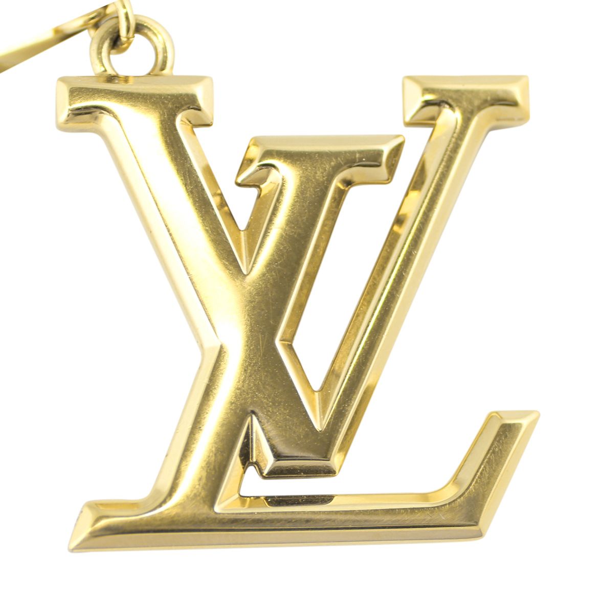 Lv facettes bag charm sale